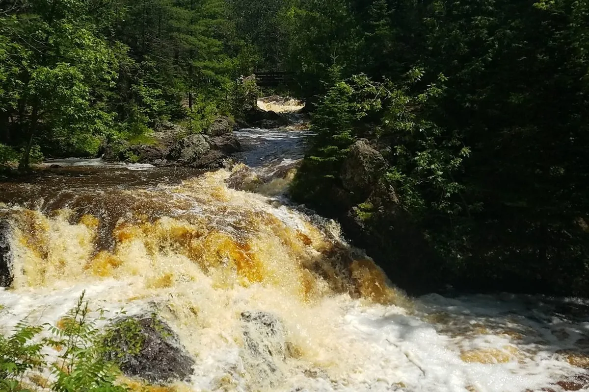 Upper Falls at Amnicon Falls State Park, the river pouring over dark rock