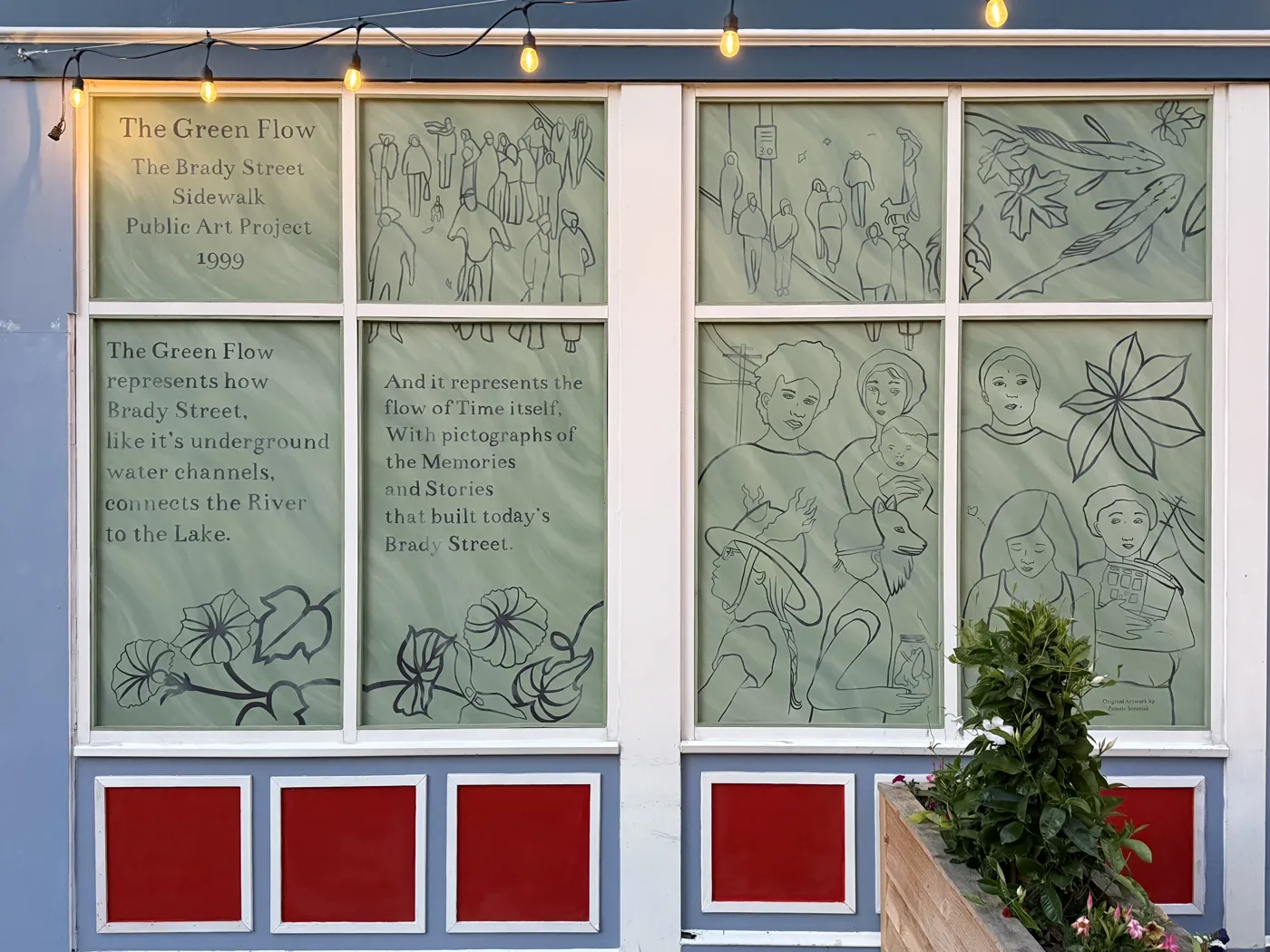 The Green Flow window mural on Brady Street