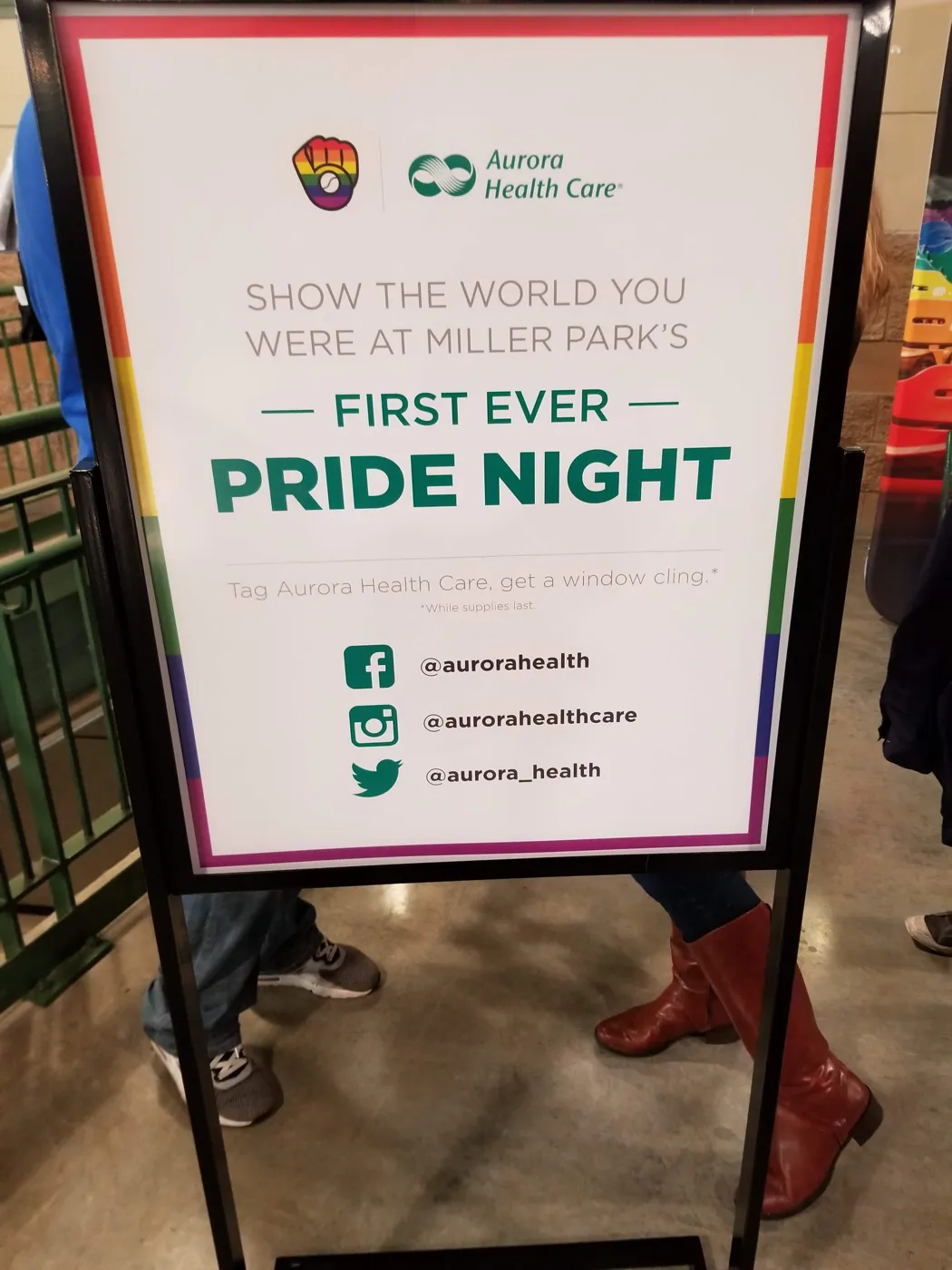 A sign reading Show the world you were at Miller Park's first ever Pride Night, from Aurora Health Care