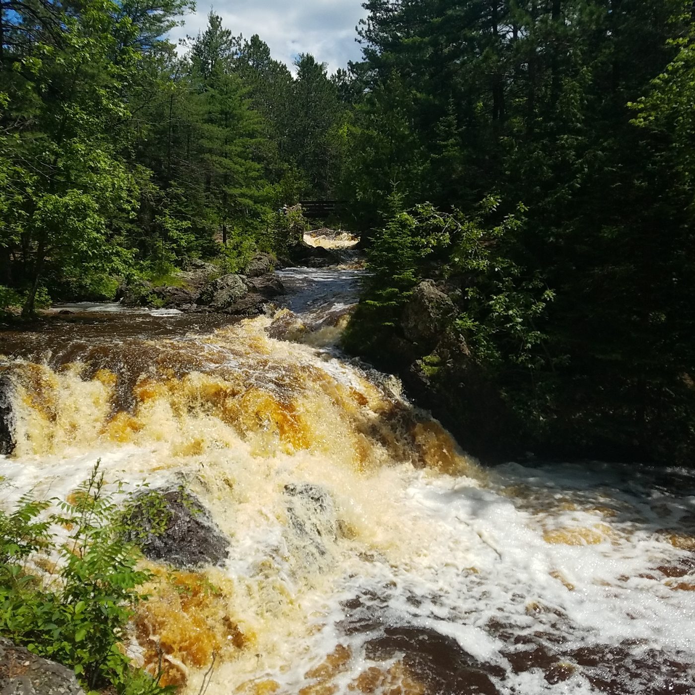 Upper Falls at Amnicon Falls State Park, the river pouring over dark rock