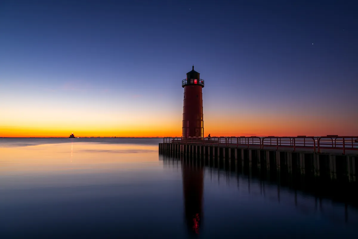 The Milwaukee breakwater lighthouse at sunrise on Lake Michigan